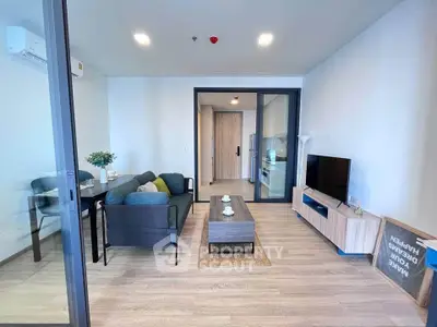 Modern living room with stylish furniture and open layout, perfect for relaxation and entertainment.