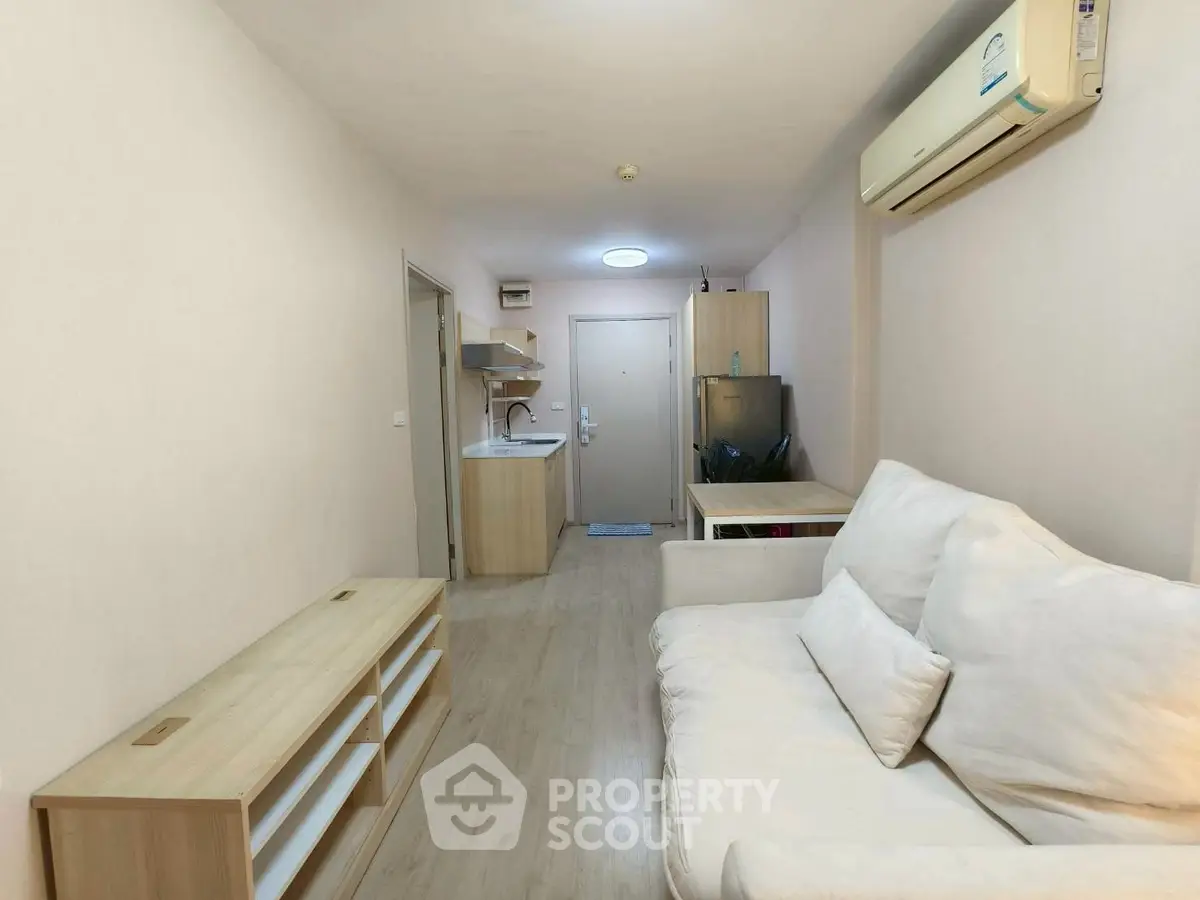 Cozy apartment living room with modern furniture and air conditioning