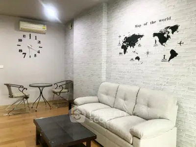 Stylish living room with world map wall art and modern furniture