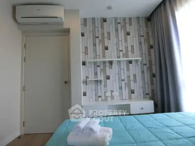 Modern bedroom with stylish accent wall and air conditioning