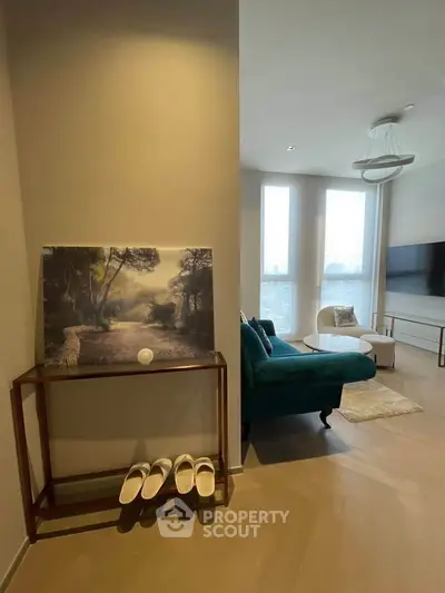 Stylish living room with modern decor and large windows for natural light