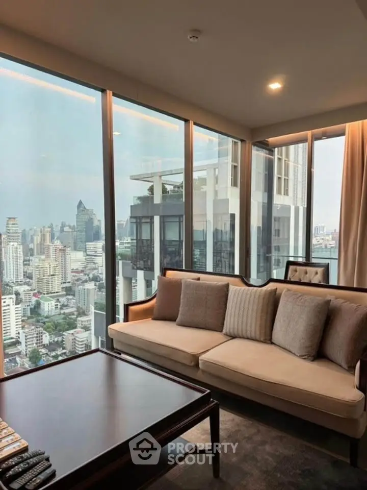Luxurious living room with panoramic city view from high-rise apartment