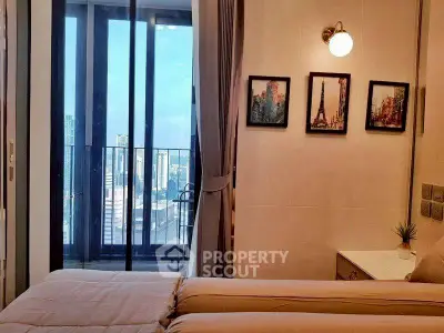 Chic bedroom with city view and elegant decor in modern apartment