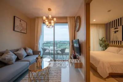 Luxurious living room with elegant decor and stunning balcony view in modern apartment