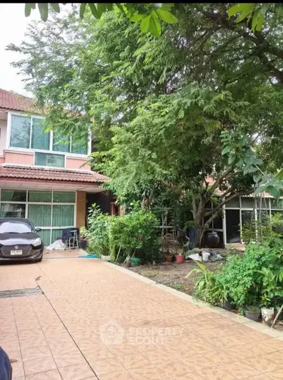 Charming suburban home with lush garden and spacious driveway