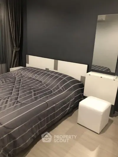 Modern bedroom with stylish decor and elegant furnishings
