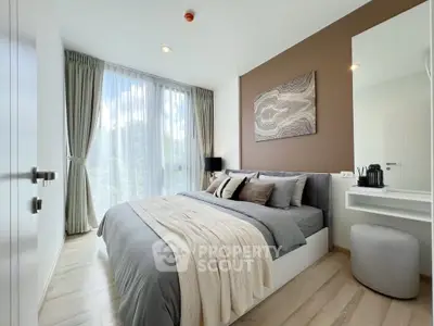 Modern bedroom with large window and stylish decor