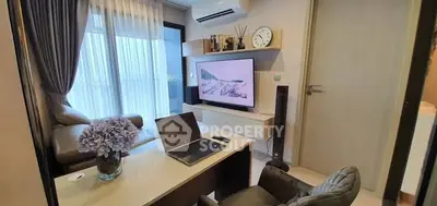 Modern living room with stylish decor and workspace setup