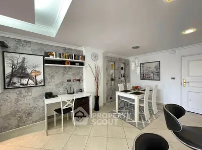Stylish modern living room with dining area and study nook, featuring elegant decor and ample natural light.