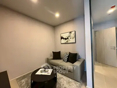 Modern living room with cozy sofa and stylish decor