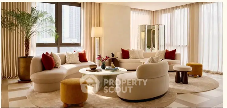 Luxurious living room with elegant furniture and large windows offering city views.