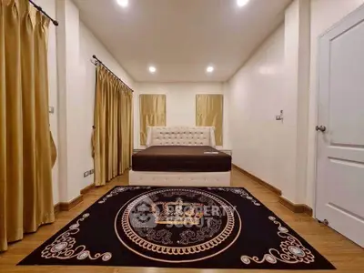Luxurious bedroom with elegant decor and plush furnishings, featuring a regal carpet and ambient lighting.