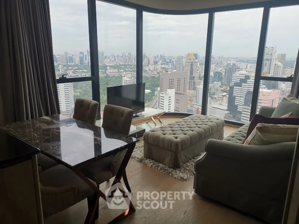 Luxurious high-rise living room with stunning city skyline view and elegant furnishings.