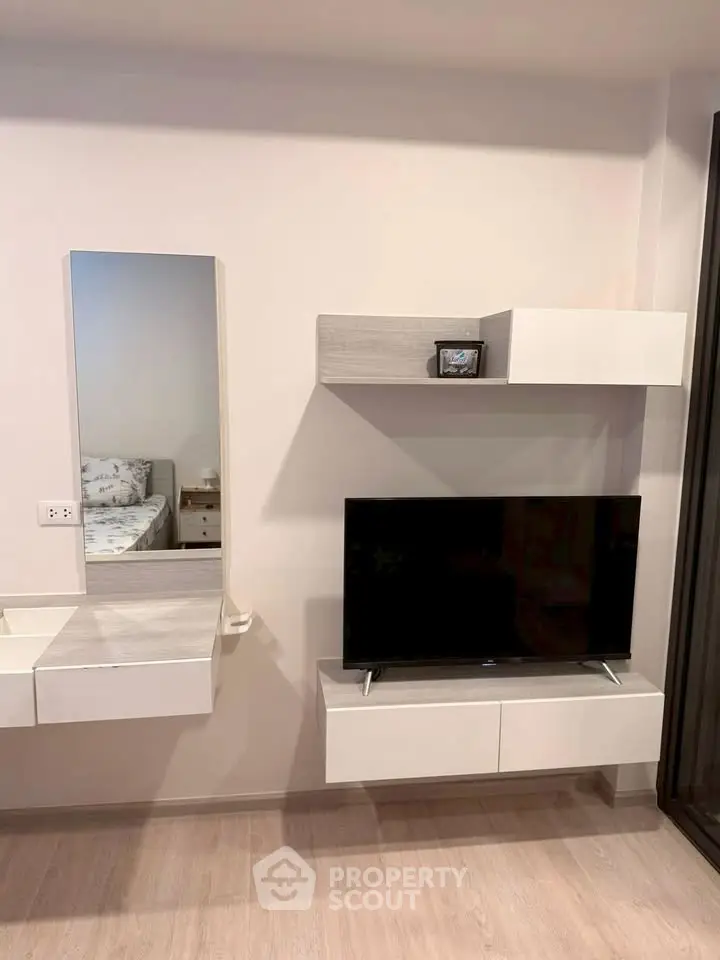 Modern living room with sleek TV unit and stylish decor