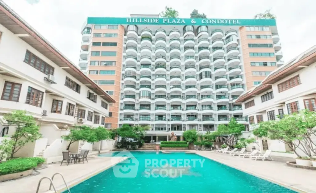 Luxurious condotel with stunning pool and modern architecture at Hillside Plaza.