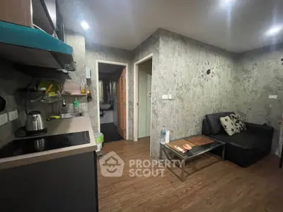 Cozy living room with modern kitchen and stylish decor