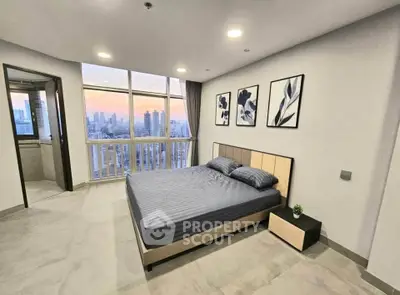 Modern bedroom with city view and stylish decor