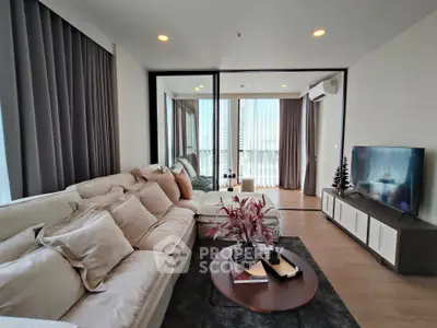 Spacious modern living room with cozy sectional sofa and stylish decor