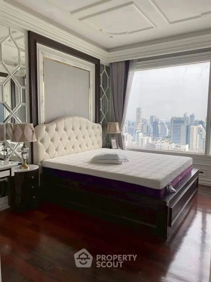 Luxurious bedroom with stunning city view and elegant decor
