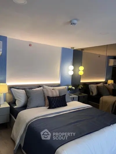 Luxurious modern bedroom with elegant lighting and stylish decor