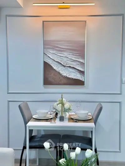 Elegant dining area with modern decor and stylish wall art