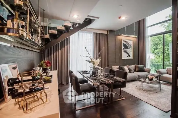 Luxurious modern living room with elegant decor and large windows offering natural light.