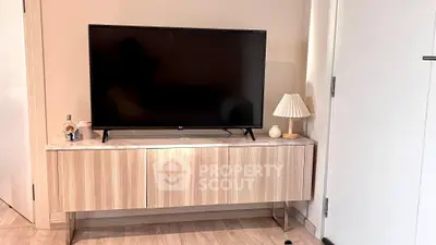 Modern living room with sleek TV stand and stylish decor