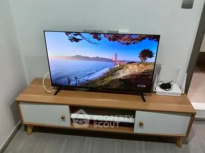 Modern living room with sleek TV unit and stylish decor