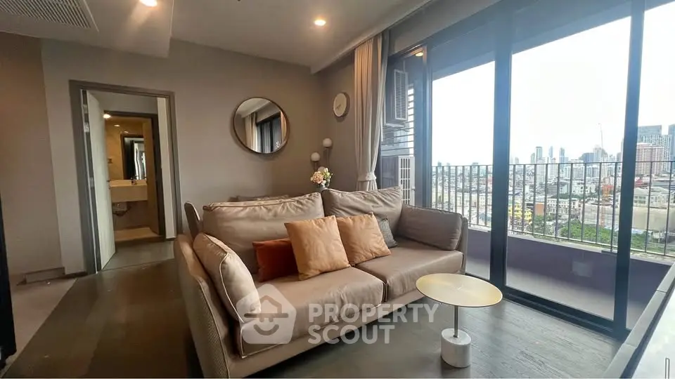 Modern living room with city view and balcony access
