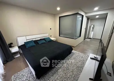 Modern bedroom with stylish decor and large bed in contemporary apartment