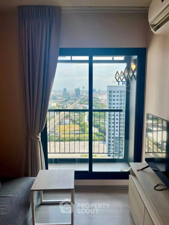 Modern living room with stunning city view from high-rise balcony