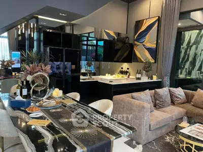 Luxurious modern living room with elegant decor and open kitchen layout