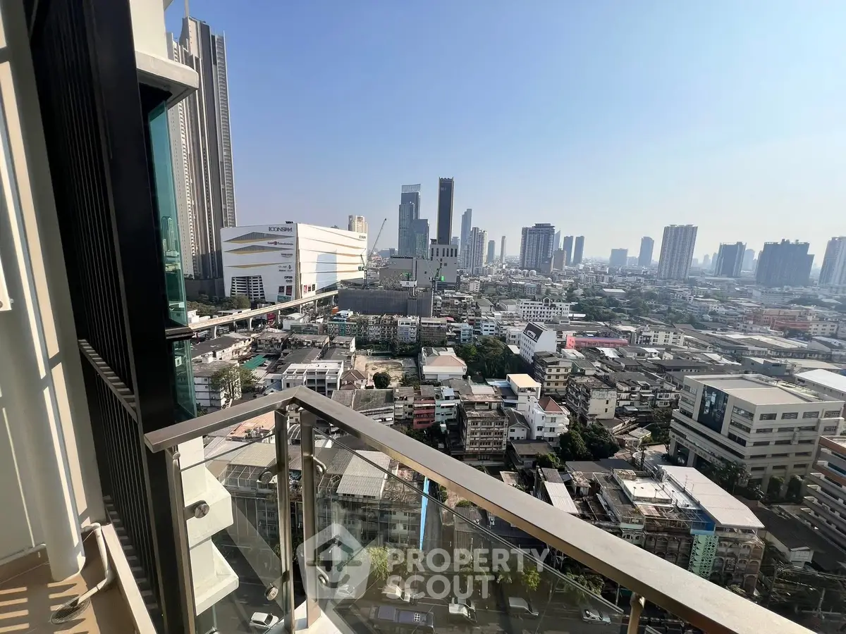 Stunning cityscape view from a high-rise balcony in urban setting