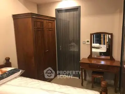 Cozy bedroom with wooden furniture and elegant decor