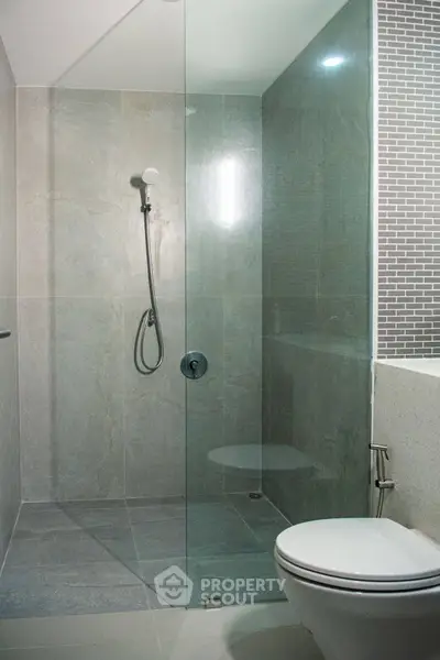 Modern bathroom with sleek glass shower and contemporary design