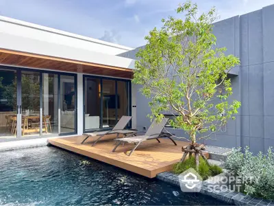 Luxurious modern home with private pool and stylish deck area