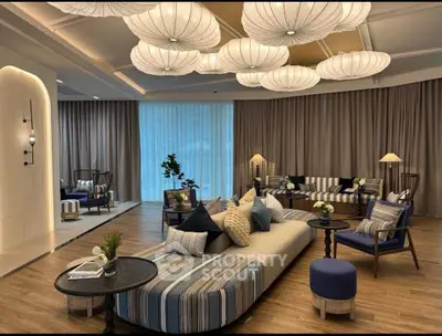 Luxurious living room with elegant decor and stylish lighting, perfect for modern living.