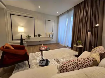 Elegant living room with modern decor and cozy seating area