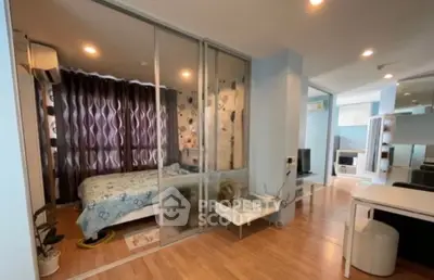 Modern apartment with glass partitioned bedroom and stylish decor