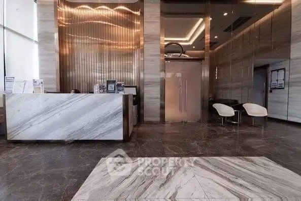 Luxurious modern building entrance with marble floors and sleek design