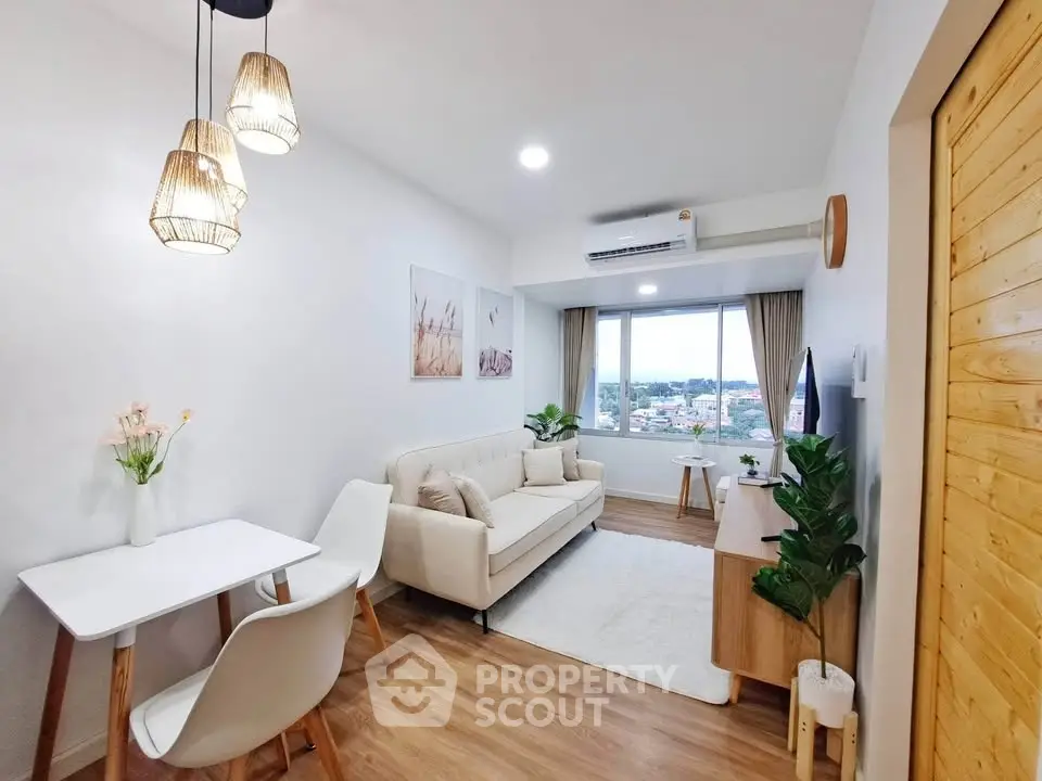 Modern living room with cozy decor and scenic window view