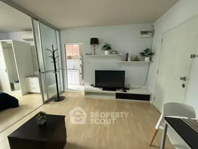 Modern living room with sleek TV setup and minimalist decor