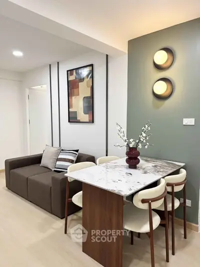 Modern living room with stylish dining area and contemporary decor
