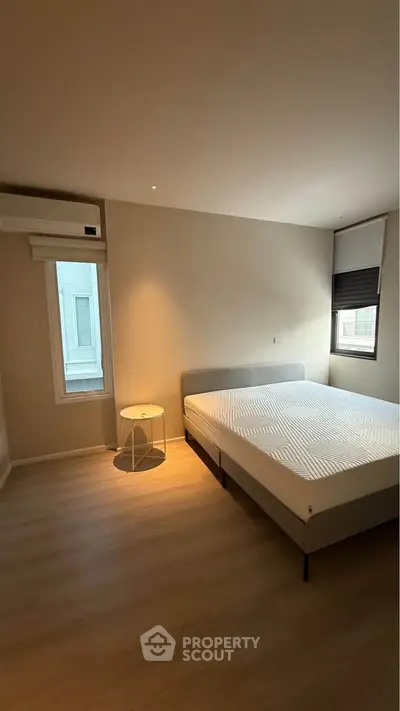 Spacious bedroom with modern design and natural light