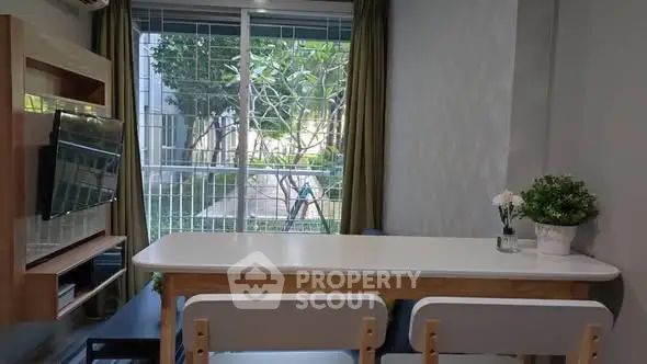 Modern living room with garden view and stylish decor