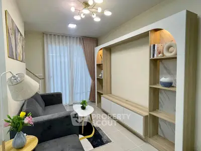 Modern living room with stylish shelving and cozy seating