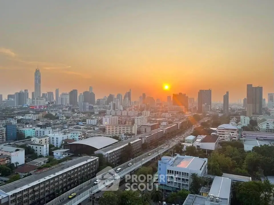 Stunning cityscape view at sunset showcasing urban skyline and vibrant city life.