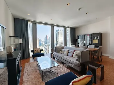 Luxurious living room with stunning city view and modern furnishings