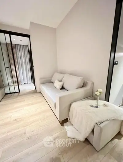 Cozy modern living room with elegant sofa and soft lighting