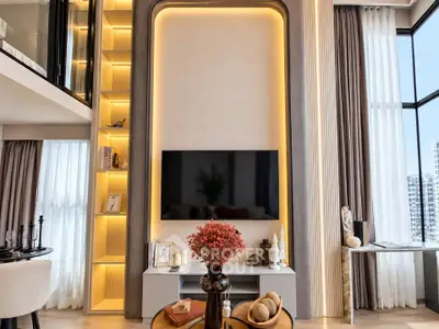 Luxurious modern living room with high ceilings and elegant decor